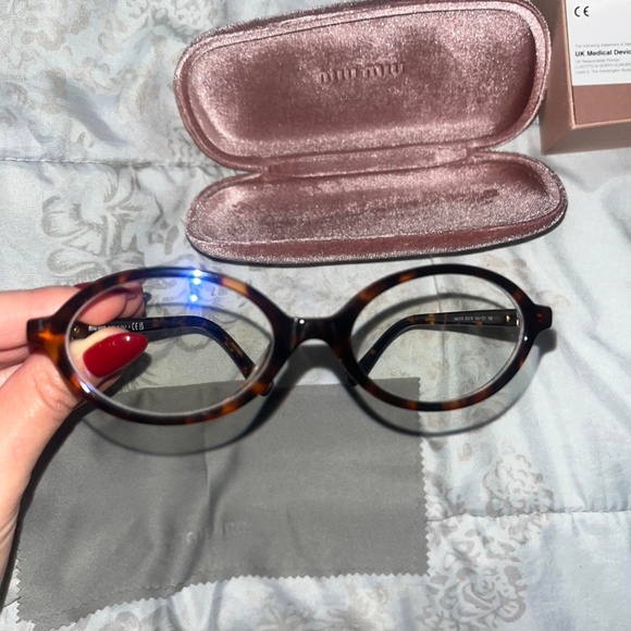 Miu Miu Women\'s Oval Glasses Brown and Black Regard Glasses main image 8